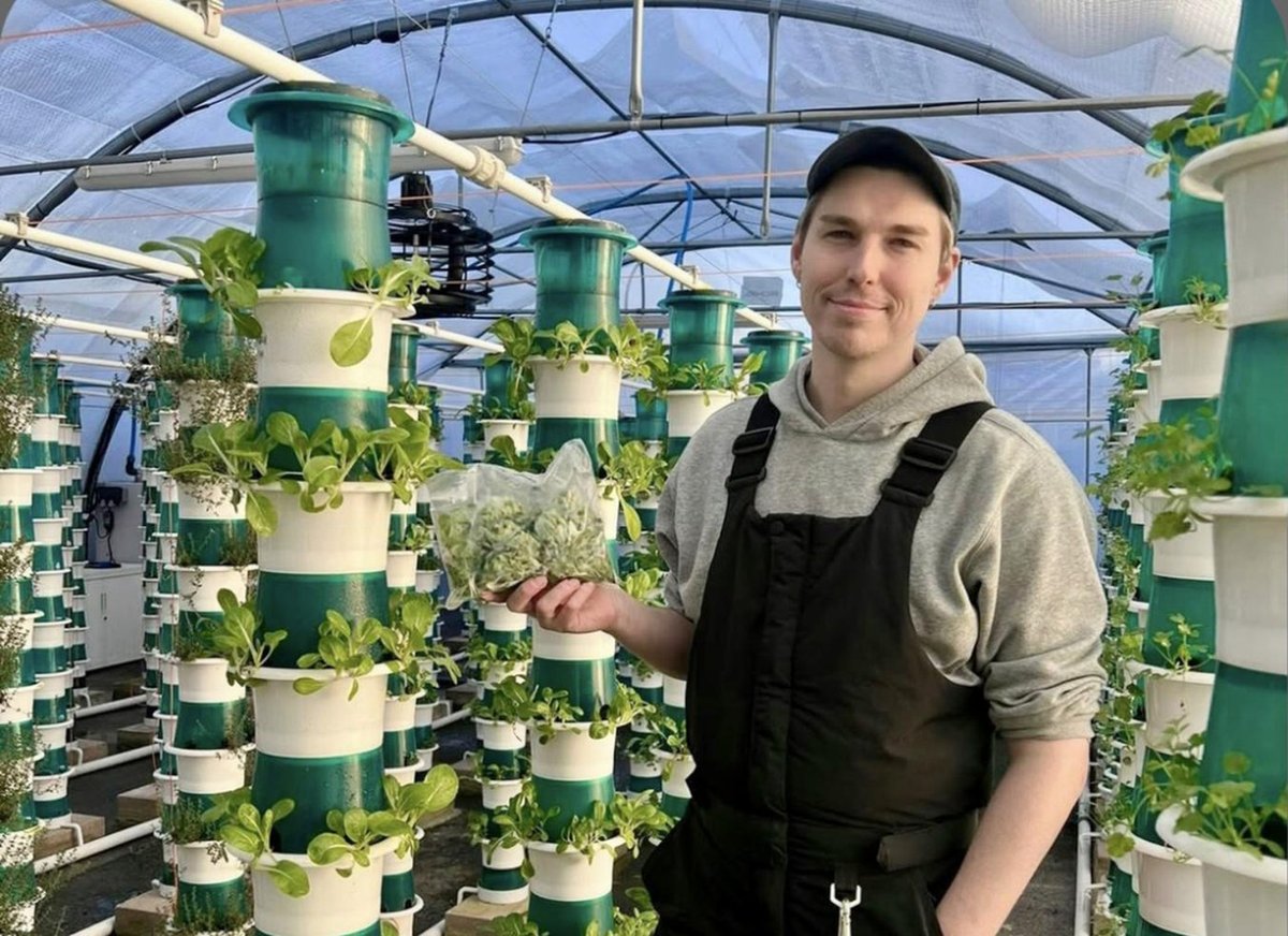 Charlie in his hydroponic tower greenhouse